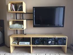 Mount the tv on the wall at a comfortable height and choose shelves that have the same color as the wall. 21 Diy Tv Stand Ideas For Your Weekend Home Project