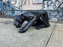 Black panther is a platform beat 'em up arcade game released by konami in 1987. Mid Century Vintage Ceramic Black Panther Coffee Table Oval Glass Top Grrrrrrr By Symmetrymodern From Symmetry Vintage Of Brooklyn Ny Attic