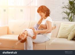 Joyful Japanese Mother Tickling Her Laughing Stock Photo 590358860 |  Shutterstock