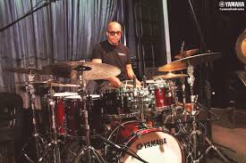 Marcus Baylor having fun at soundcheck performing with Kenny Garrett.  Marcus plays Yamaha Absolute Hybrid Maple in Classic Walnut finish and new  14" x 7" Recording Custom Stainless Steel Snare (RLS1470), 13"