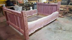 You'll need a hammer, pry bar, circular saw, cedar boards, paint, plywood, screws, and a few more tools. Bed Frame Cedar Bed Post Bed Custom Made Frame Cedar Frame Cedar Post Bed Bed With Posts Bed Frame Rustic Bed Frame