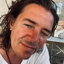 In 1964, Jim Templeton took a photo of his daughter near Solway Firth,  England. When developed, the image showed a strange figure behind her,  resembling a spaceman in a white suit. Jim