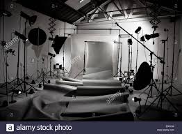 A Photography Studio With All The Lighting Equipment And Paper Stock Photo Alamy