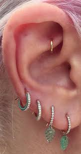 Cool Unique Ear Piercing Ideas Gold Rook Ring Earring Four Hoops Mybodiart Com Unique Ear Piercings Stud Earrings Unique Piercing Jewelry