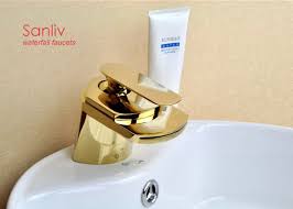 gold finish waterfall bathroom sink