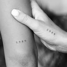Symbolic Birth Year Tattoo Designs Little Tattoos On Instagram Matching Birth Year Tattoos By Dominik Thewho Berlin Tiny Finger Tattoos Small Finger Tattoos Matching Tattoos