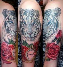Tattoo clouds — a universal idea. 15 Best Tiger And Rose Tattoo Designs Petpress