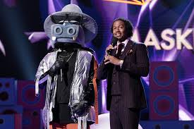 The masked singer (abbreviated as tms) is an american reality singing competition television series that premiered on fox on january 2, 2019. The Masked Singer On Fox What The Holy Hell Is This Ew Com