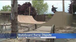 I've been working on converting my backyard to a skate park for a while now, and finally ordered enough wood to finish the mini ramp. Backyard Skateboard Ramp At Center Of Riverbank Neighbor Fight Youtube