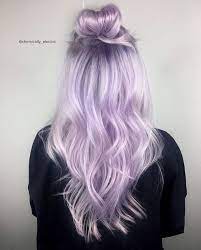 Purple hairstyles require some maintenance Vpinspiration In Love With This Purple Top Bun Hairstyle By Chemically Electric More Hair Inspirations Please Foll Lilac Hair Color Hair Styles Lilac Hair