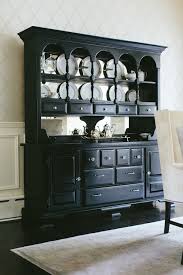 Add tons of storage to your dining room with this beautiful rustic buffet with hutch. Black Buffet And Hutch Transitional Dining Room Kate Marker Interiors