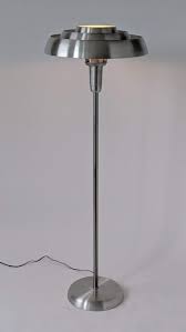 Huge selection of futuristic floor lamps. 1940s 2 Kurt Versen Saturn Style Art Deco Aluminum Floor Lamp Usa For Sale At 1stdibs