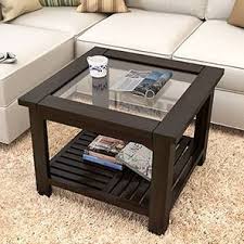 Round tripod side table is made of wood with double glass top, and was designed by enrico paulucci for vitrex in 1960. Glass Coffee Table Buy Glass Top Coffee Tables Online Urban Ladder