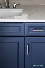 These cabinets are made from mdf wood (medium density fiberboard) or cheap particle board wood that is laminated with just like laminate cabinets, painters can paint over this surface (if it's in good condition) with a little preparation and the right equipment. How To Paint Thermofoil Cabinets Life On Virginia Street
