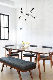 Maximise your dining space whether it's entertaining your friends, enjoying meals with your family or simply making the most of the available space in your dining area, a corner dining set is the logical solution. Mid Century Dining Room With Dark Walnut Table And Tufted Bench Seat On One Side Of Dining Room Small Mid Century Modern Dining Room Modern Dining Room Tables
