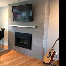 Is your electric fireplace plenty warm and romantic, but lacks a certain something that could take it up a notch in the aesthetics arena. Curved Stainless Steel Floating Shelfshelves Oval Modern Etsy In 2021 Fireplace Tv Wall Modern Fireplace Mantles Modern Fireplace