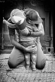 Black And White Kids Hugging Each Other The Best Hugs Love Cute Photography Black And White Hug Country Father Son Hats Father And Son Future Kids Kids