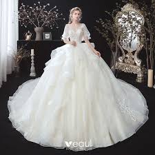 Victorian Style Ivory See Through Bridal Wedding Dresses 2020 V Neck Ball Gown Puffy 1 2 Sleeves Backless Appliques Lace Beading Cathedral Train Ruffle Short Sleeve Bridal Gown Wedding Dresses Lace Ballgown Long Sleeve