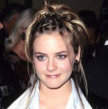 90's and 2000's hairstyles featuring clips and messy buns