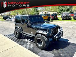 Image result for Brilliant Black 2003 Jeep
