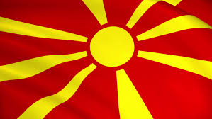 The flag of north macedonia is the national flag of the republic of north macedonia and depicts a stylized yellow sun on a red field, with eight broadening rays extending from the center to the edge of the field. North Macedonia Macedonia National Flag Stock Footage Video 100 Royalty Free 1051593193 Shutterstock