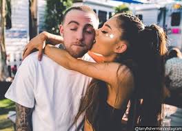 The singer sat perched on the stage steps with her boyfriend, dancing and looking at each other flirtatiously while. Ariana Grande Sports Diamond Ring At Her Benefit Concert Is She Engaged To Mac Miller