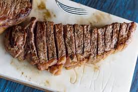 (when rain threatens to put a damper on your outdoor activities. Traeger Grilled New York Strip Pellet Grill Steak Recipe