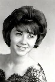 My newly found long lost cousin sent me some photos. That's me in the  stroller and her next to me at the 1954 Centennial. The other is of my  parents holding Gail.