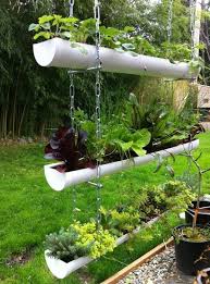 Good Free Garden Planters Easy Strategies Pots Tubs And Half Barrels Full Of Flowers Add Appeal To Your Gard Gutter Garden Hanging Garden Small Garden Design