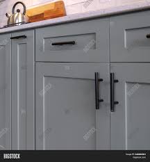 Black kitchen & cupboard handles in modern or rustic designs & finishes. Photo Square Frame Image Photo Free Trial Bigstock
