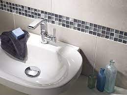 Apply mastic to the back of the pencil molding with a putty knife and press into place. Metallic Mosaic Border Black Mosaic Tile Mosaic Tiles Uk Black Glass