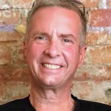 Day #2 at Brown & Brown Insurance. I wish I had known sooner how slimming  standing next to a giant sign could be!