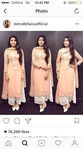 Try a soft blue cashmere sweater with a pink jacket for a day look that will melt away any remnants of winter. Color Combination Indian Designer Outfits Dress Indian Style Indian Outfits