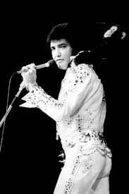 Elvis On Stage In 1973 With A Monkey On His Back Elvis Elvis Presley Las Vegas Hilton