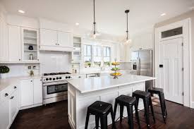 Farmhouse kitchen cabinets modern farmhouse kitchens kitchen redo home kitchens kitchen ideas farmhouse sinks farmhouse style kitchen white rustic light gray and white kitchen with a classic design features stacked light gray shaker cabinets accented with nickel pulls and fitted with. Bright White Shaker Cabinets In Modern Farmhouse Kitchen Farmhouse Kitchen Other By Denise Quade Design Houzz
