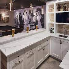 If you want the bar to look professional, you'll also need a sink and some display shelves for the bottles and glasses. Basement Bar Sink Design Ideas
