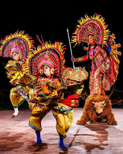 Members of the Gujarati Siddi tribe perform during a 'Siddi Dhamal' performance at Lok Rang 2025, in Jaipur