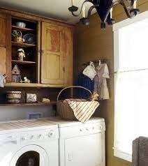 Rustic Cabinetry And Chandelier Primitive Laundry Rooms Country Laundry Rooms Laundry Room Decor
