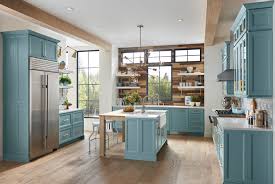A sky blue, or a bolder deeper blue, can really work as a background shade to set off the unique elements of the wood grain in the cabinets. Blue Kitchen Cabinets A Trending Design Wellborn Cabinet Blog
