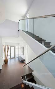 Fraser Residence In Ottawa Looks Like Closely Bound Volumes Stacked Together Modern Staircase Staircase Design Fraser Residence