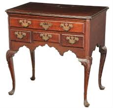 Balancing comfort and style, this shapely arched wingback sofa features queen ann legs and an elegantly upholstered beige and floral seat and back cushion. Queen Anne Furniture Still Stylish 2 Centuries Later