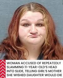 A woman was arrested after allegedly slamming an 11-year-old's head into a  slide and telling the girl's mother that she hoped the girl died. ➡  https://tinyurl.com/3bx7nvxe