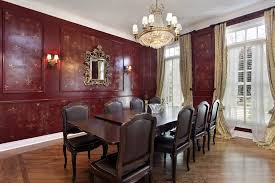 Lit by a square red lantern, a cherrywood dining table is surrounded by black cane dining chairs placed on a blue rug. 50 Red Dining Room Ideas Photos Home Stratosphere
