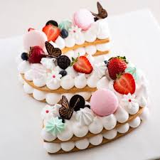 Alicia has created each letter of the alphabet, so you can request whichever letter(s) you'd like! Alphabet Numeric Tart Cake 2kg At 120 00 Per Cake Eatzi Gourmet Bakery