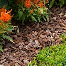 The main purposes of mulch are to suppress weeds, enrich the soil with nutrients, regulate soil temperature, improve moisture retention, prevent soil erosion. Mulch What It Means How It S Used In Landscaping