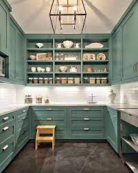 Food was to be stored in the storeroom and larder, much of the the modern householder's list for cheap kitchen furniture in 1872: Modern Victorian Landhausstil Kuche Austin Von Tim Brown Architecture Houzz
