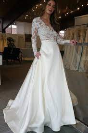 New styles at hebeos.com, we carry the latest trends in wedding dresses to show off that fun and flirty style of yours. Wedding Dress With Sleeves Weddingdresswithsleeves A Line Wedding Dress Alinewedd Long Sleeve Satin Wedding Dress Online Wedding Dress Wedding Dress Sleeves