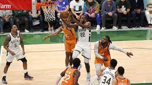 — khris middleton scored 22 points, jrue holiday added 19 points and 12 assists and the milwaukee bucks moved a win from a berth in the. Lje6sj1xvjxeqm