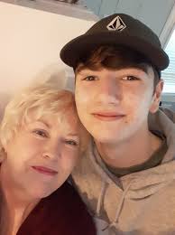 Grandfather and grandson spending quality time at the beach