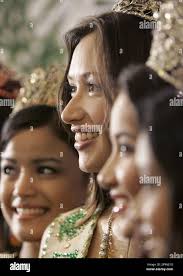 Miss Earth 2007 Jessica Nicole Trisko from Vancouver, Canada, second from  left, poses beside Miss Philippines-Air 2008 Marie Razel Equia, Miss  Philippines Earth 2008 Karla Paula Henry and Miss Philippines-Water 2008  Marian